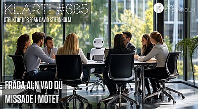 En grupp människor sitter runt ett bord i ett modernt mötesrum där en humanoid robot deltar i diskussionen.